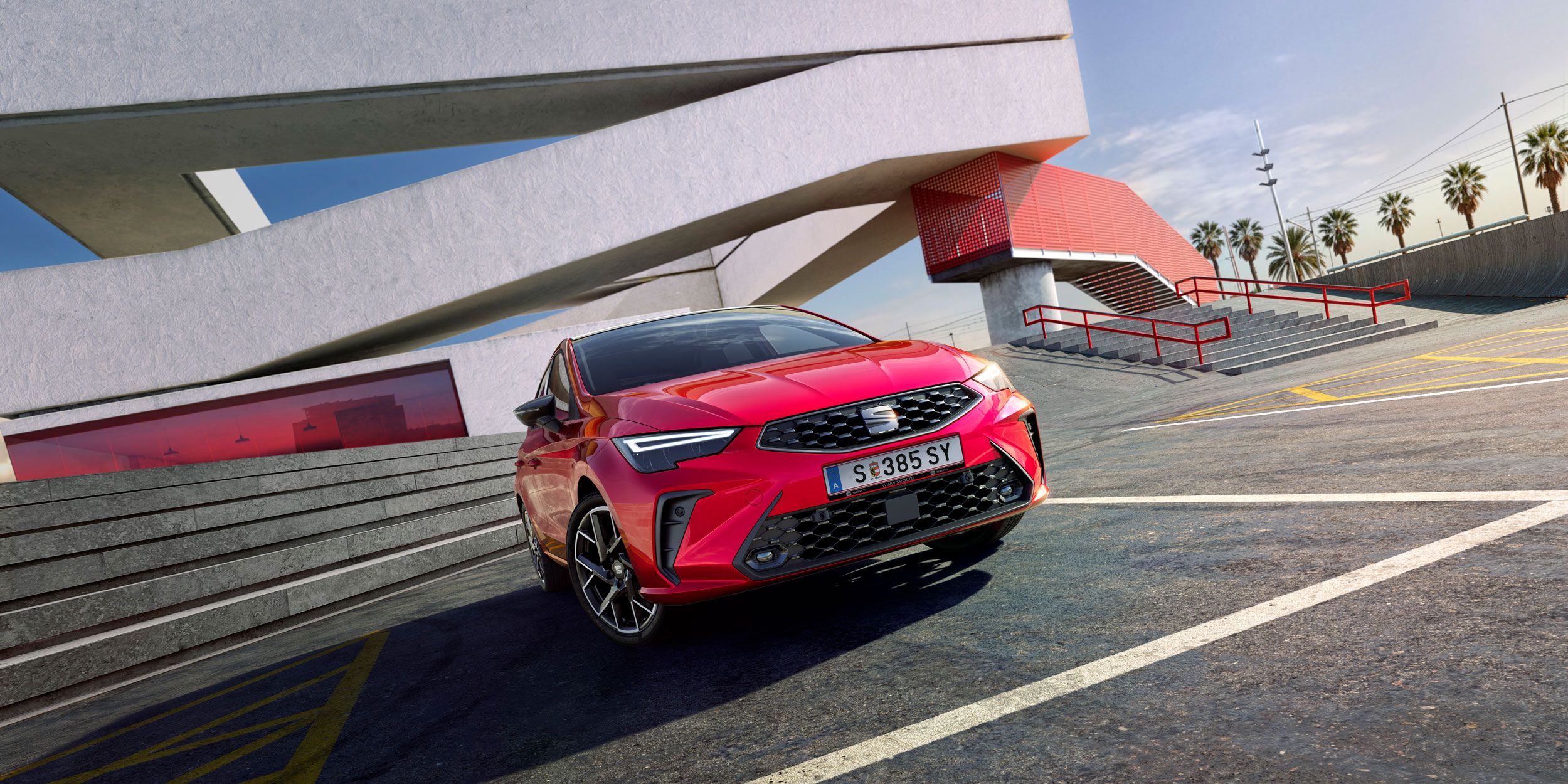  Pohled na SEAT Ibiza 2025 v červené barvě, zaparkovaný venku